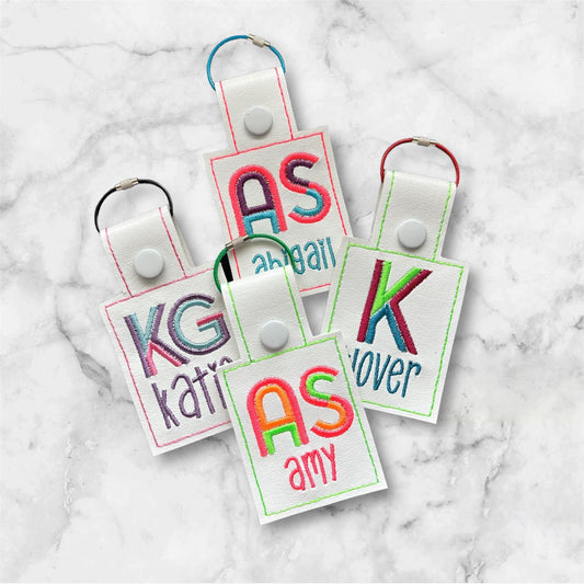 WHITE Block Monogram Embroidered Bag Tag