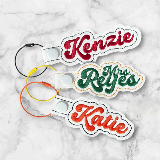 WHITE school spirit Embroidered Bag Tag with script name